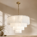 Alaric Alabaster Multi-Layer Round Chandelier in a warm neutral Pamlamp interior