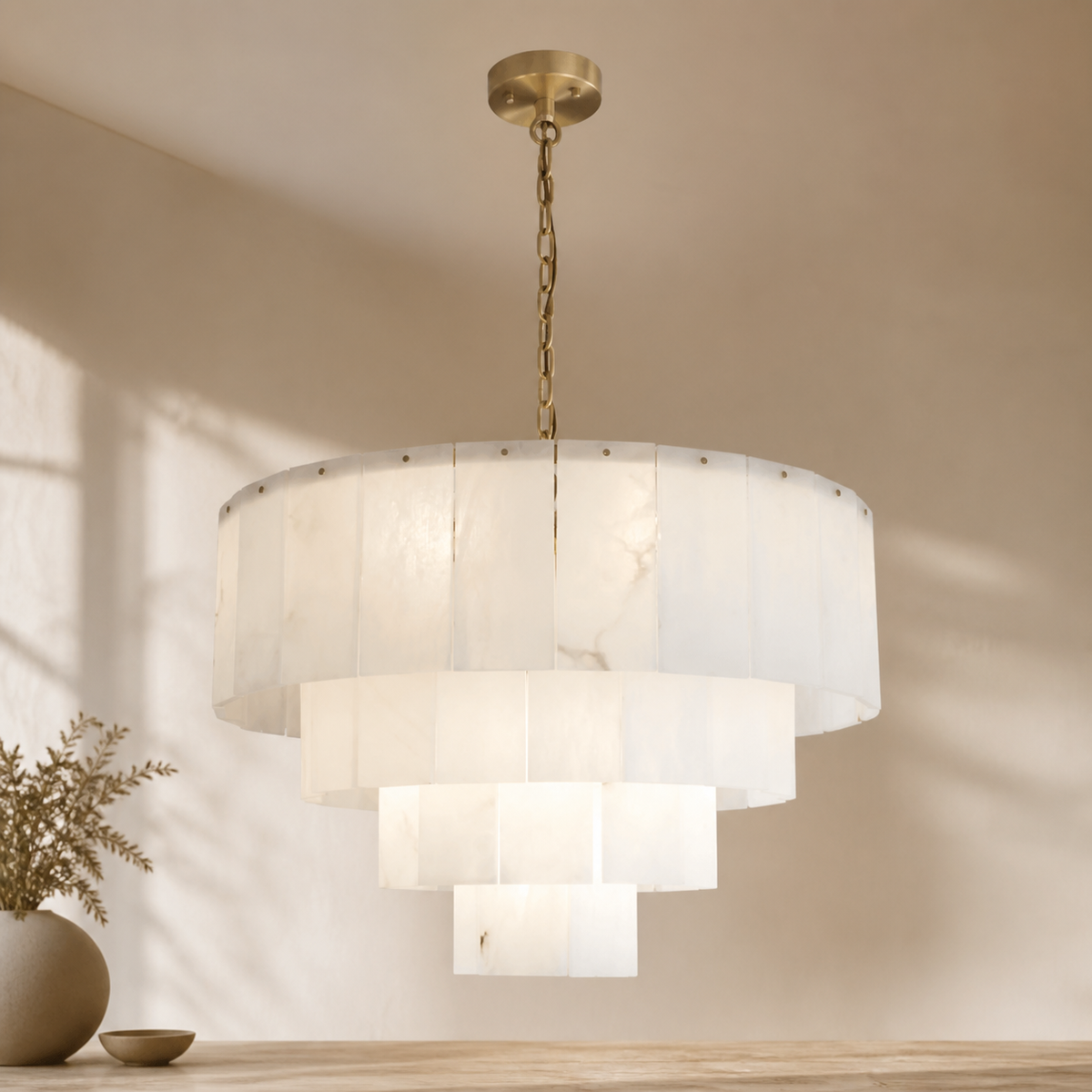 Alaric Alabaster Multi-Layer Round Chandelier in a warm neutral Pamlamp interior