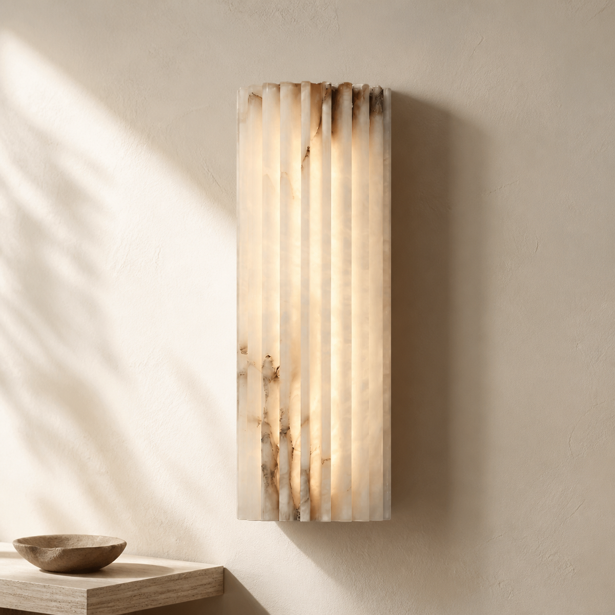 Alvia Alabaster Wall Light in a warm neutral Pamlamp interior