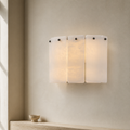 Blason Alabaster Wall Sconce in a warm neutral Pamlamp interior