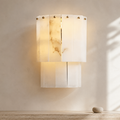 Elegant Layered Alabaster Wall Sconce in a warm neutral Pamlamp interior