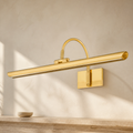 Elowyn Modern Brass Picture Light in a warm neutral Pamlamp interior