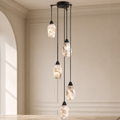 Emilia Alabaster Pendant Lighting Over Dining Table in a warm neutral Pamlamp interior