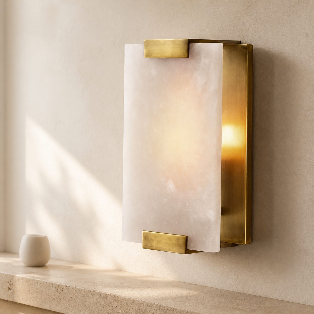 Modern Alabaster Sconce in a warm neutral Pamlamp interior