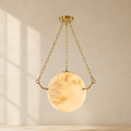 Sphere Atlas Alabaster Pendant Lamp in a warm neutral Pamlamp interior